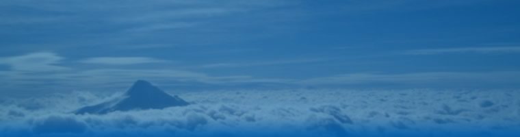 Mount Hood rises above the clouds.